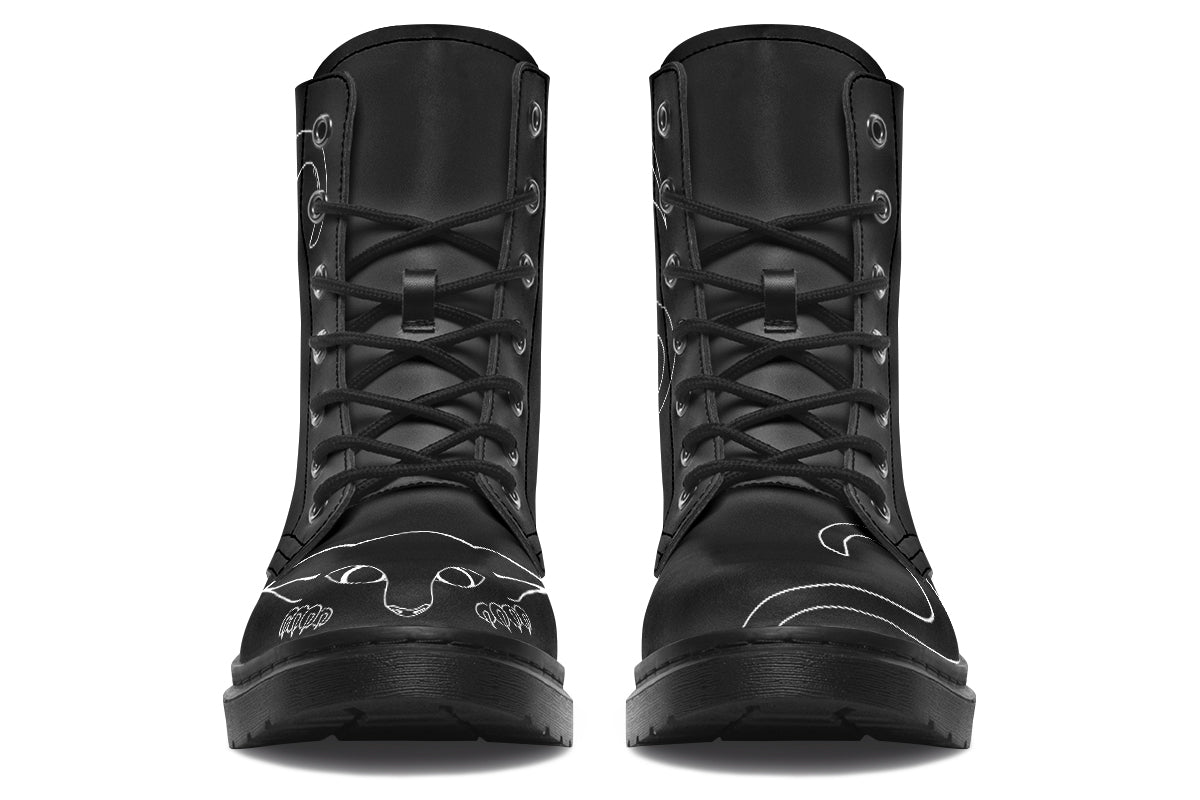 Alternative fashion boots featuring hand-drawn kitten artwork