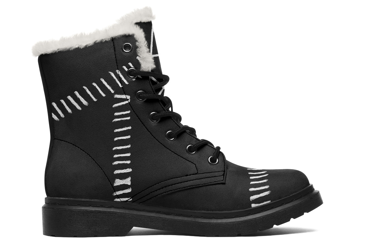 Black winter boots with white fur lining on a white background
