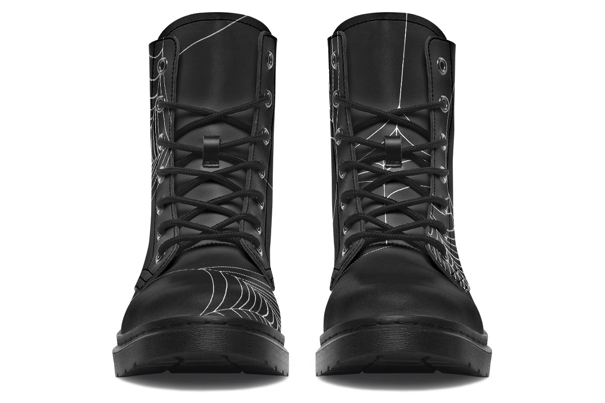 Front view of Caught Up In Your Web AntiBrand boots with spiderweb artwork