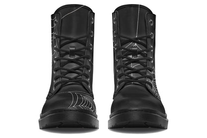 Front view of Caught Up In Your Web AntiBrand boots with spiderweb artwork