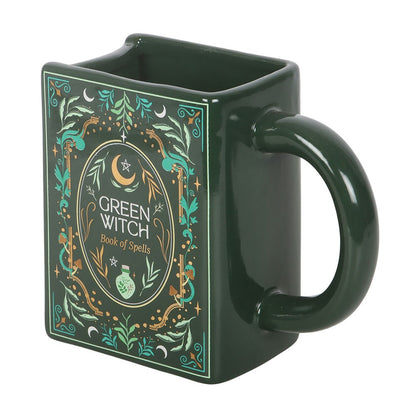Gothic Gifts Green Witch Book of Spells Ceramic Mug in a green color with mystical design elements.