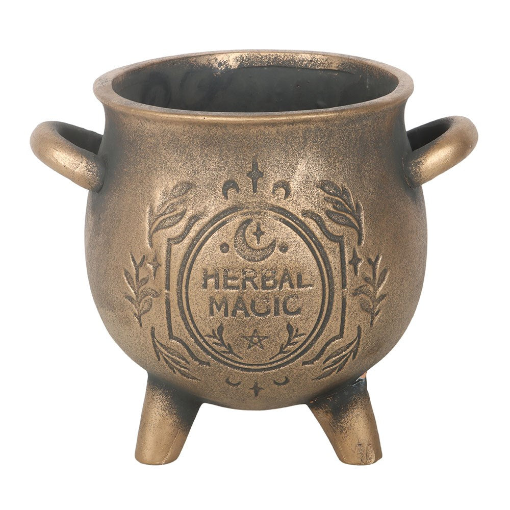 Front view of the Herbal Magic cauldron plant pot showing the embossed mystical design and tripod legs.