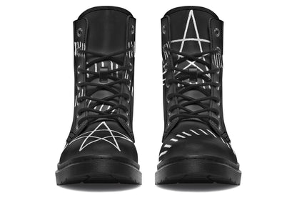 Black high-top boots with star designs on a white background