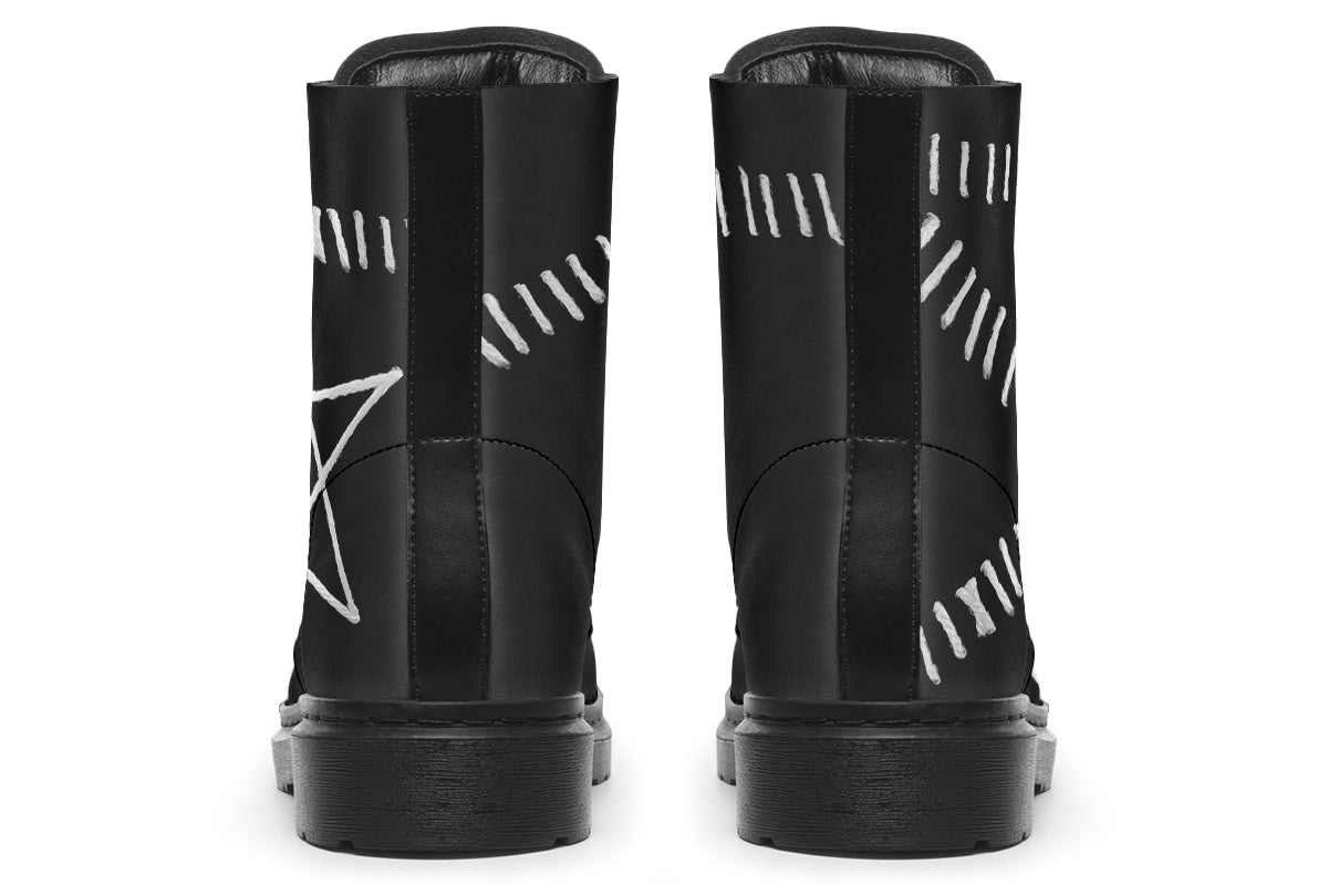 Black boots with white star and stitches designs on a white background