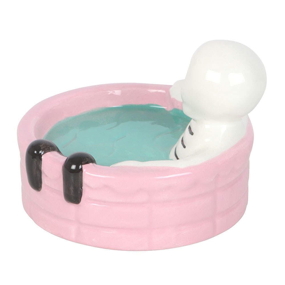Gothic Trinket Dish featuring a skeleton lounging in a pastel pink pool for spooky summer vibes.