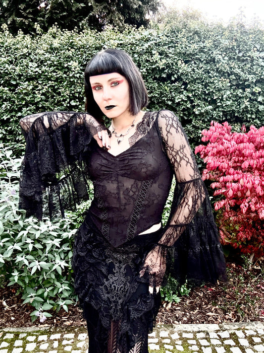 Julia Rose Noir wearing the Punk Rave Rowena Gothic Fishtail Maxi Skirt with the Dark in Love Zuri Gothic Bell Sleeve Top close up of the top
