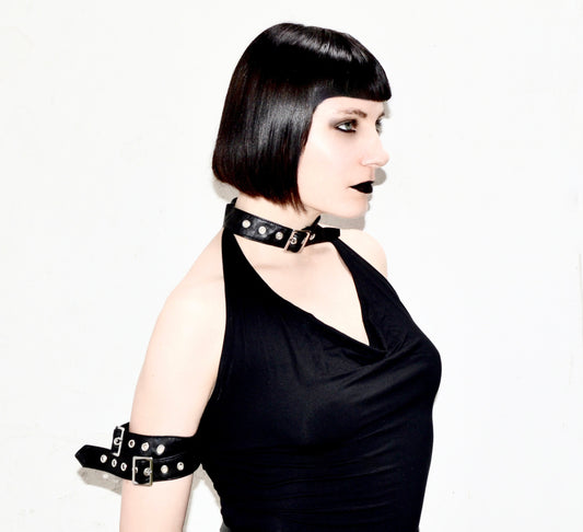 Aphrodite gothic top on model Julia Rose - plunge cowl neck faux leather arm straps Necessary Evil