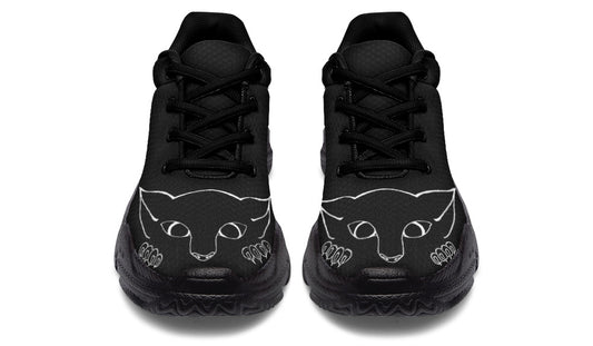 Black high-top sneakers with cat face designs on a white background