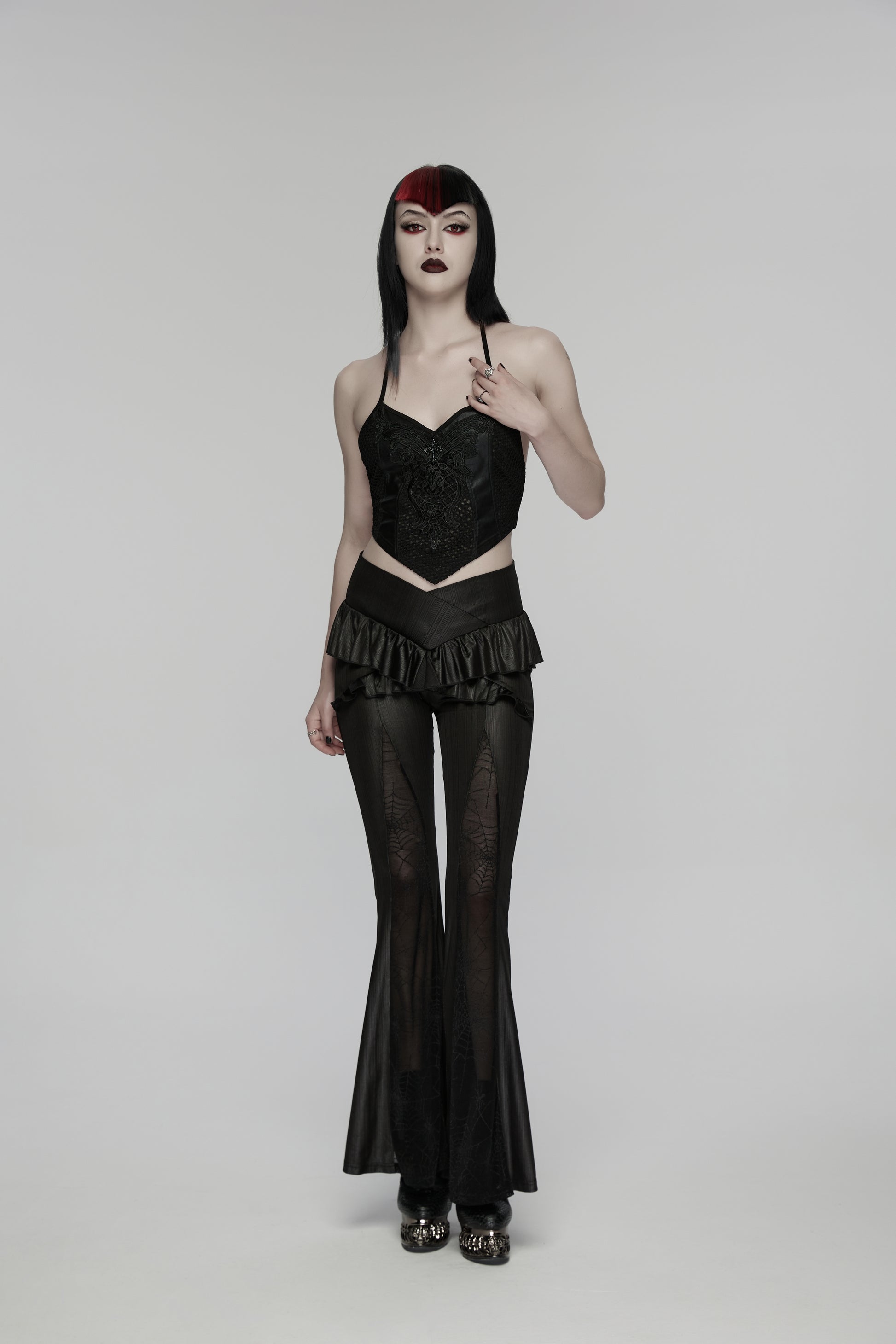 Model wearing Punk Rave Bellatrix Goth Leggings Flares with Spiderweb Panel