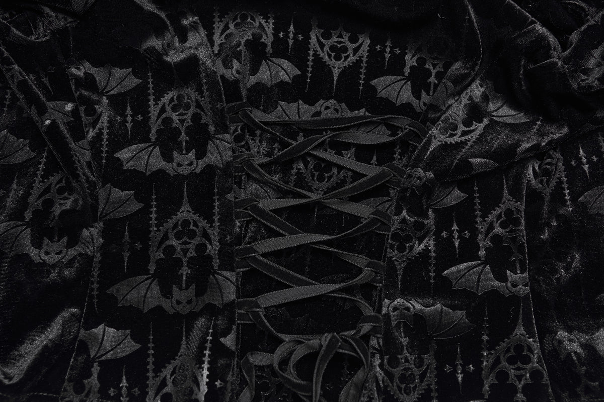 Black velvet fabric with a dark gray gothic pattern featuring bats, skulls, and lace-up corset details.