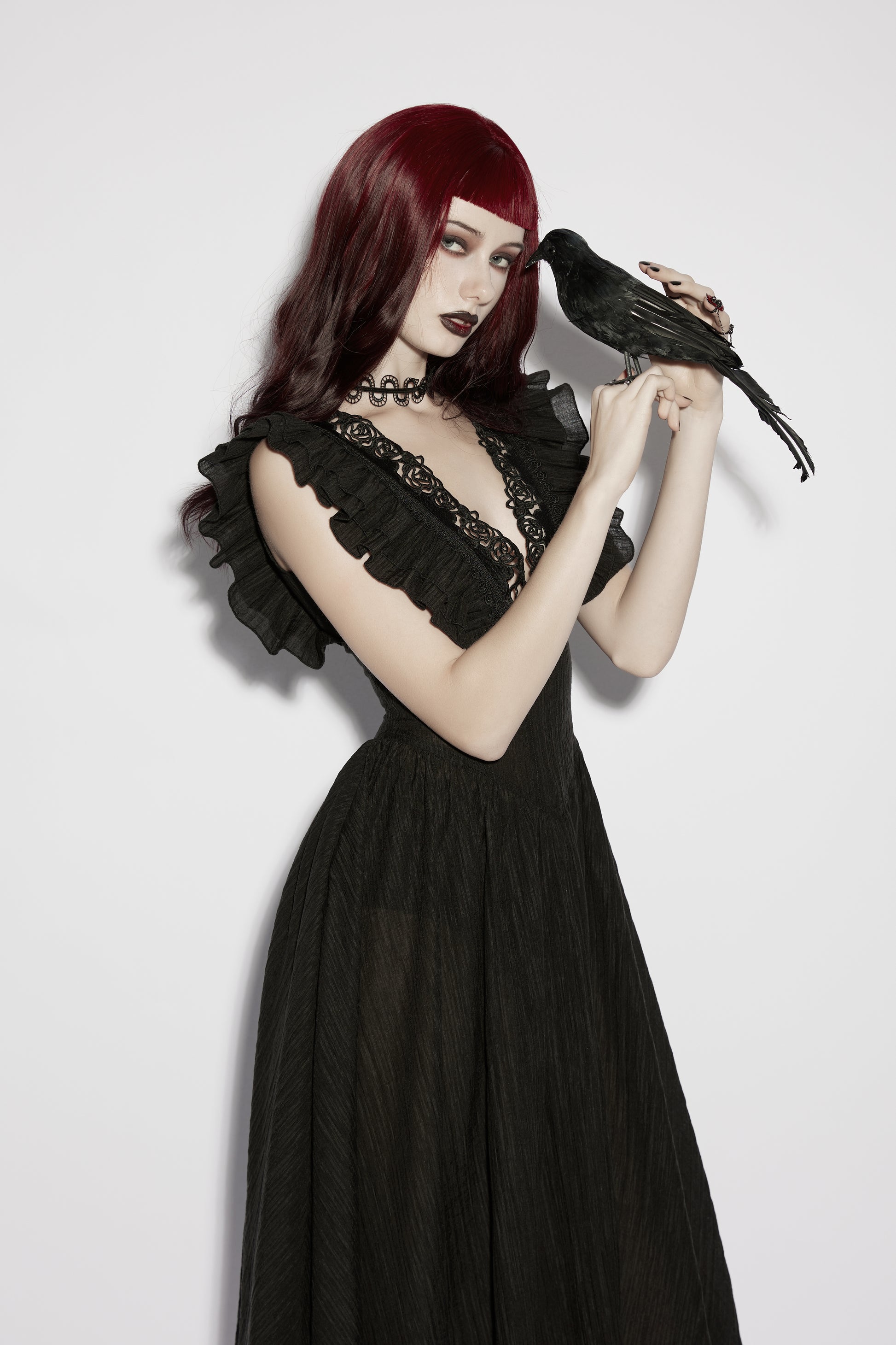 Punk Rave Elowen Goth Romantic V-Neck Flying Sleeve Dress worn by model with red hair and crow.