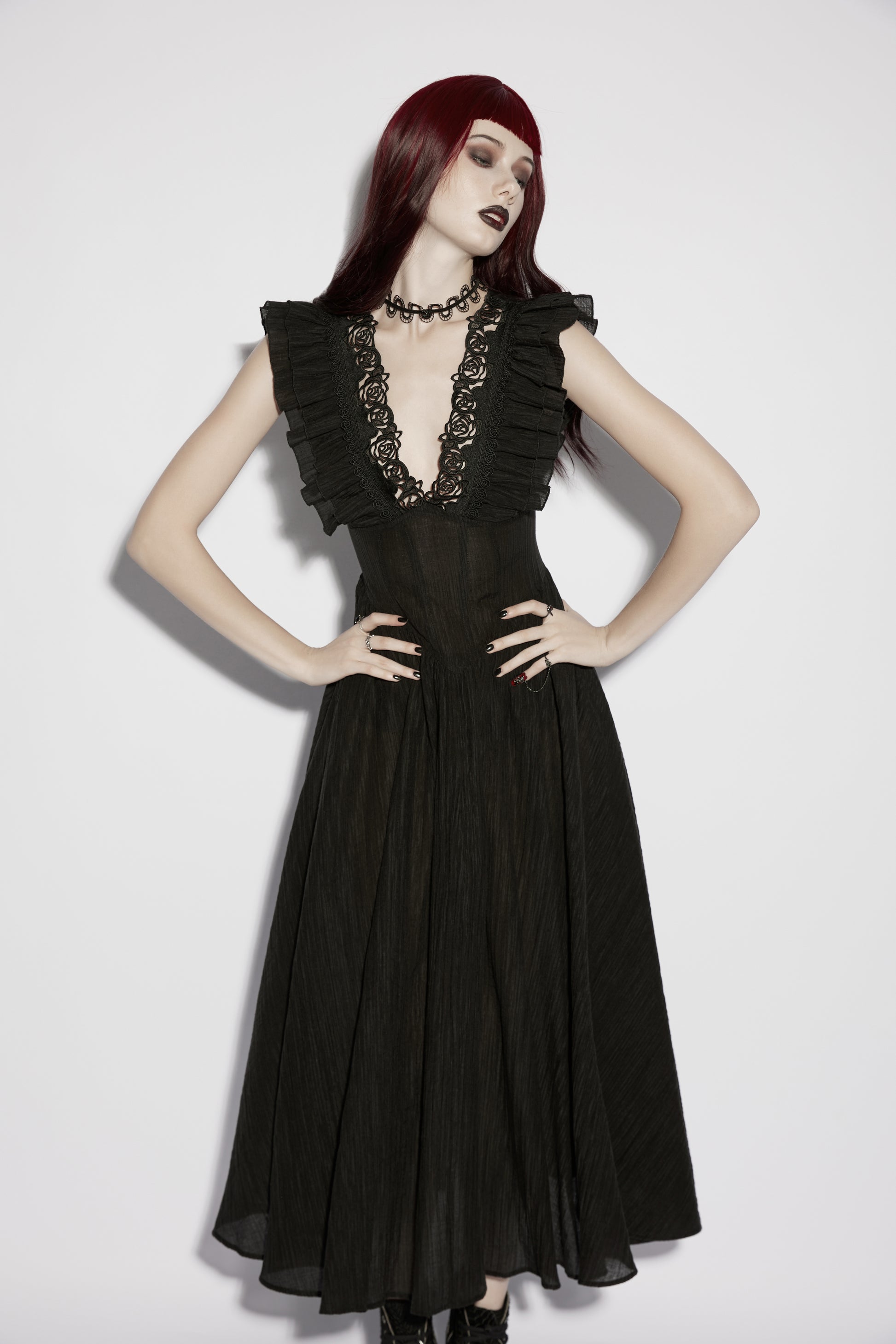 Punk Rave Elowen Goth Romantic V-Neck Flying Sleeve Dress on a model, showcasing its dark elegance and lace detailing.