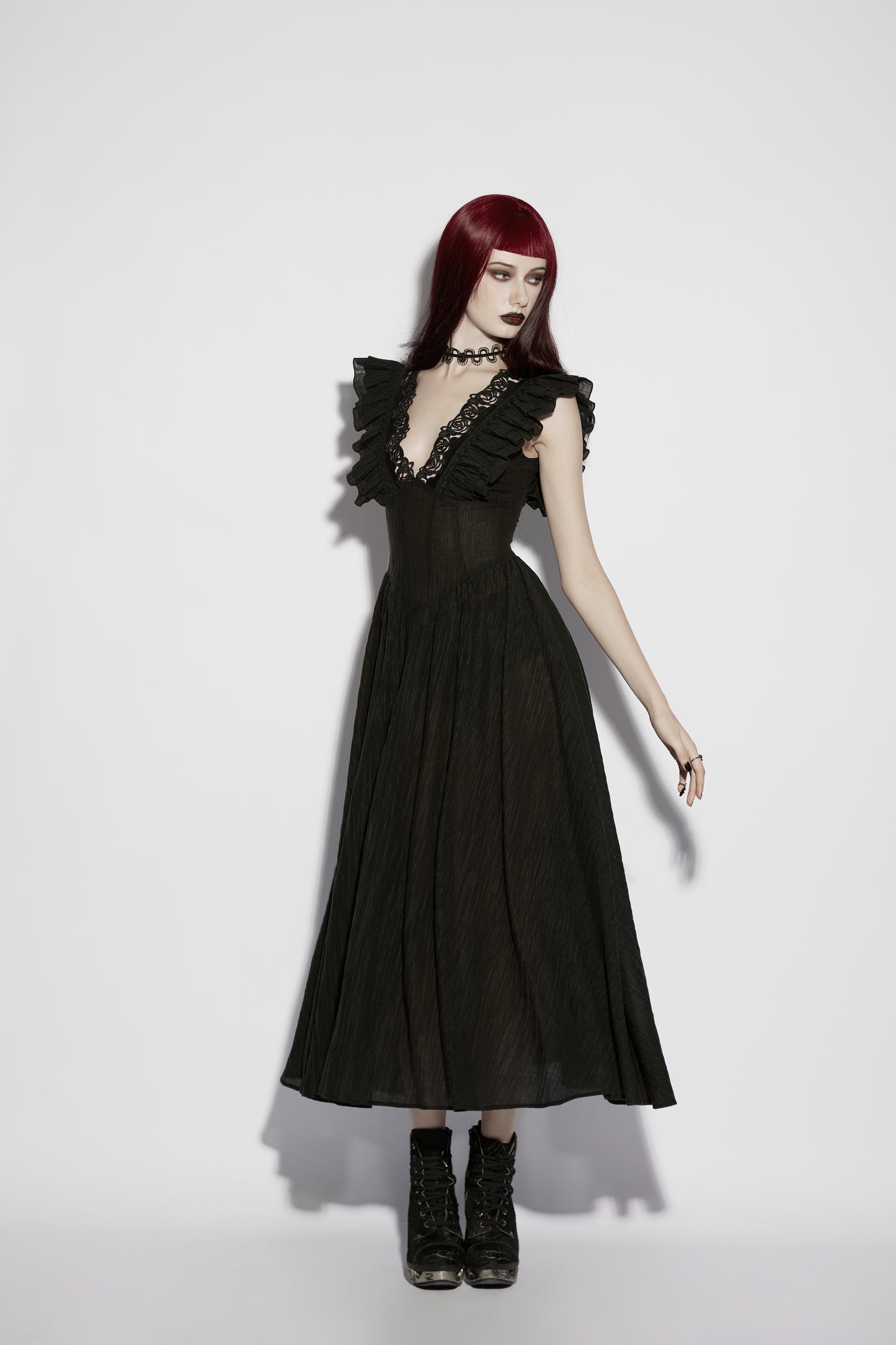 Model wearing the Punk Rave Elowen goth romantic v-neck dress with flying sleeves and lace detailing.