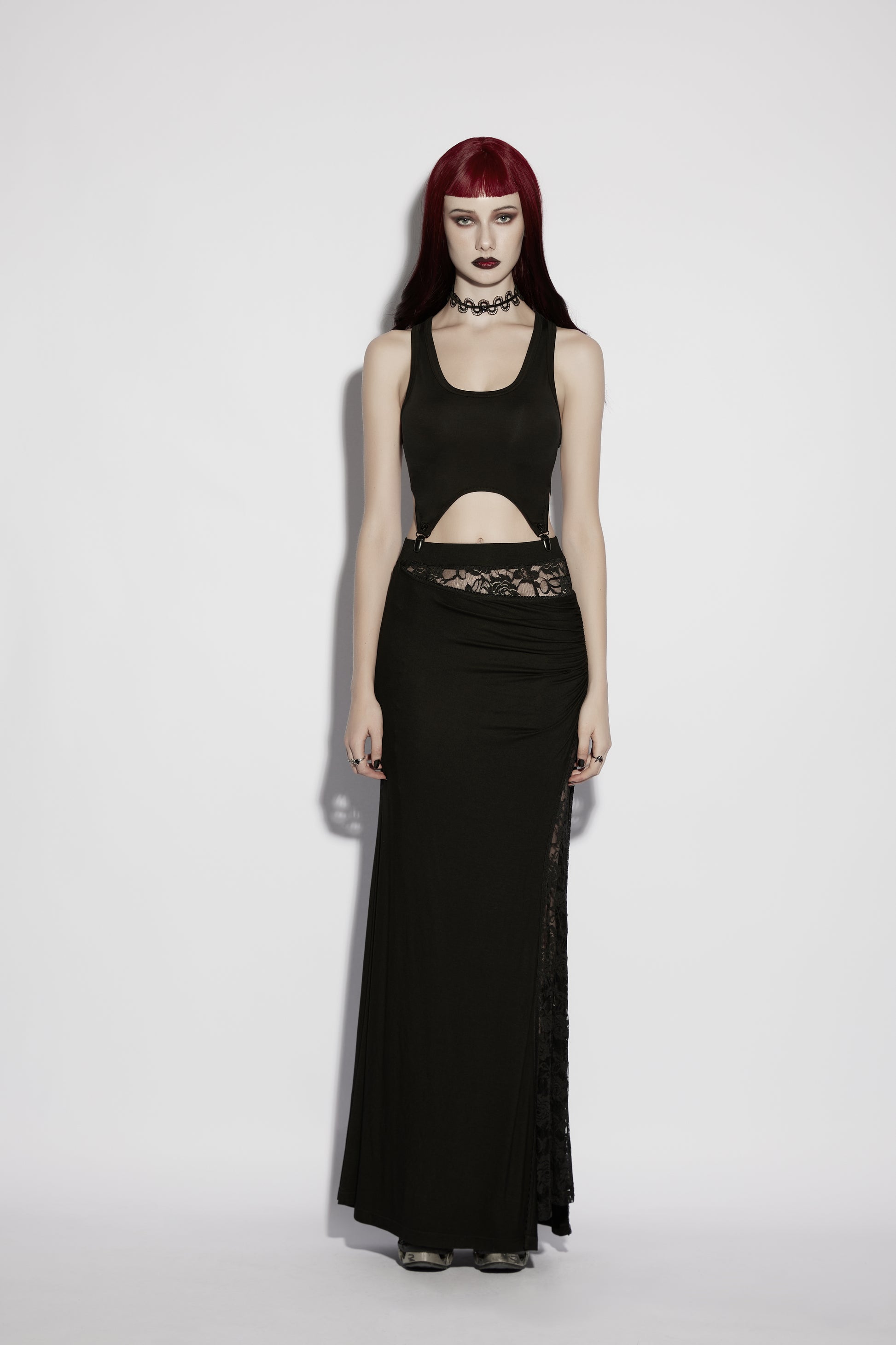 Gothic black maxi skirt with asymmetric floral lace insert on model