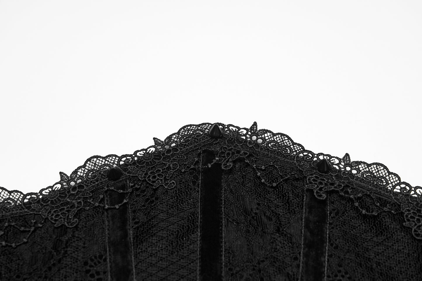 Black lace trim on a white background