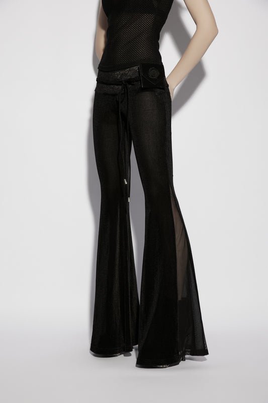 Punk Rave Lilith Low Waist Flared Pants displayed on a mannequin, showcasing the sheer fabric and flared design.