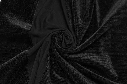 Close-up of luxurious black fabric, showcasing the texture for the Punk Rave Lilith Low Waist Flared Pants.