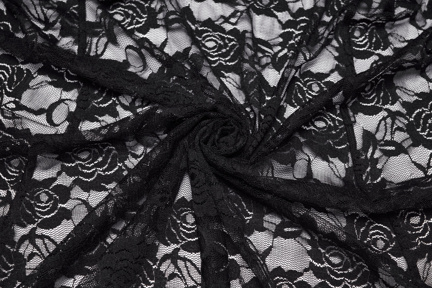 Close-up of black lace fabric with floral patterns