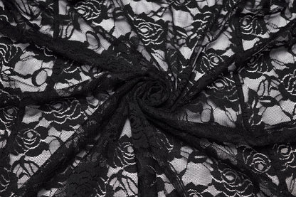 Close-up of black lace fabric with floral patterns