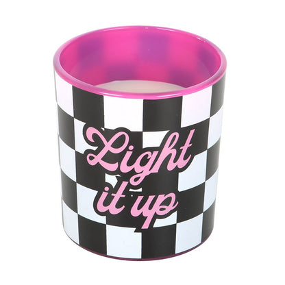 Strawberry vanilla candle in a black and white checkerboard holder with pink typography saying 'Light it up'.
