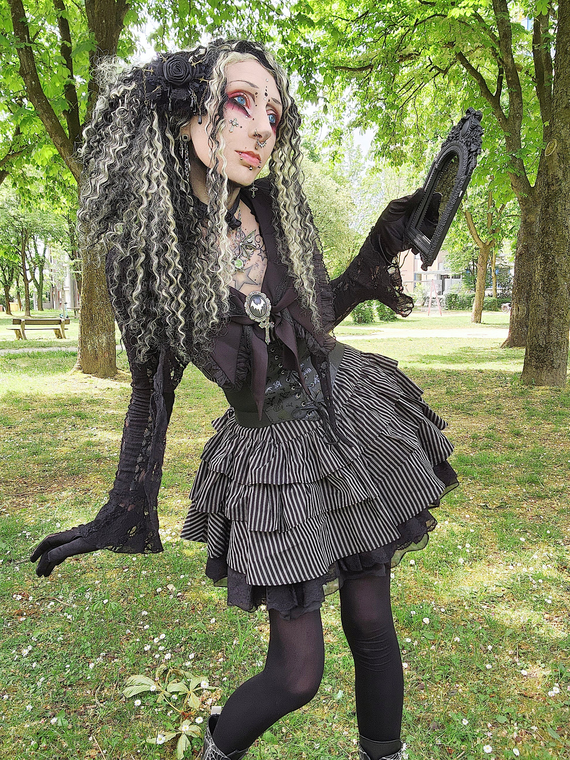 Valentinescorpse Dark in Love Vintage Striped Ruffle Tier Dress in a park