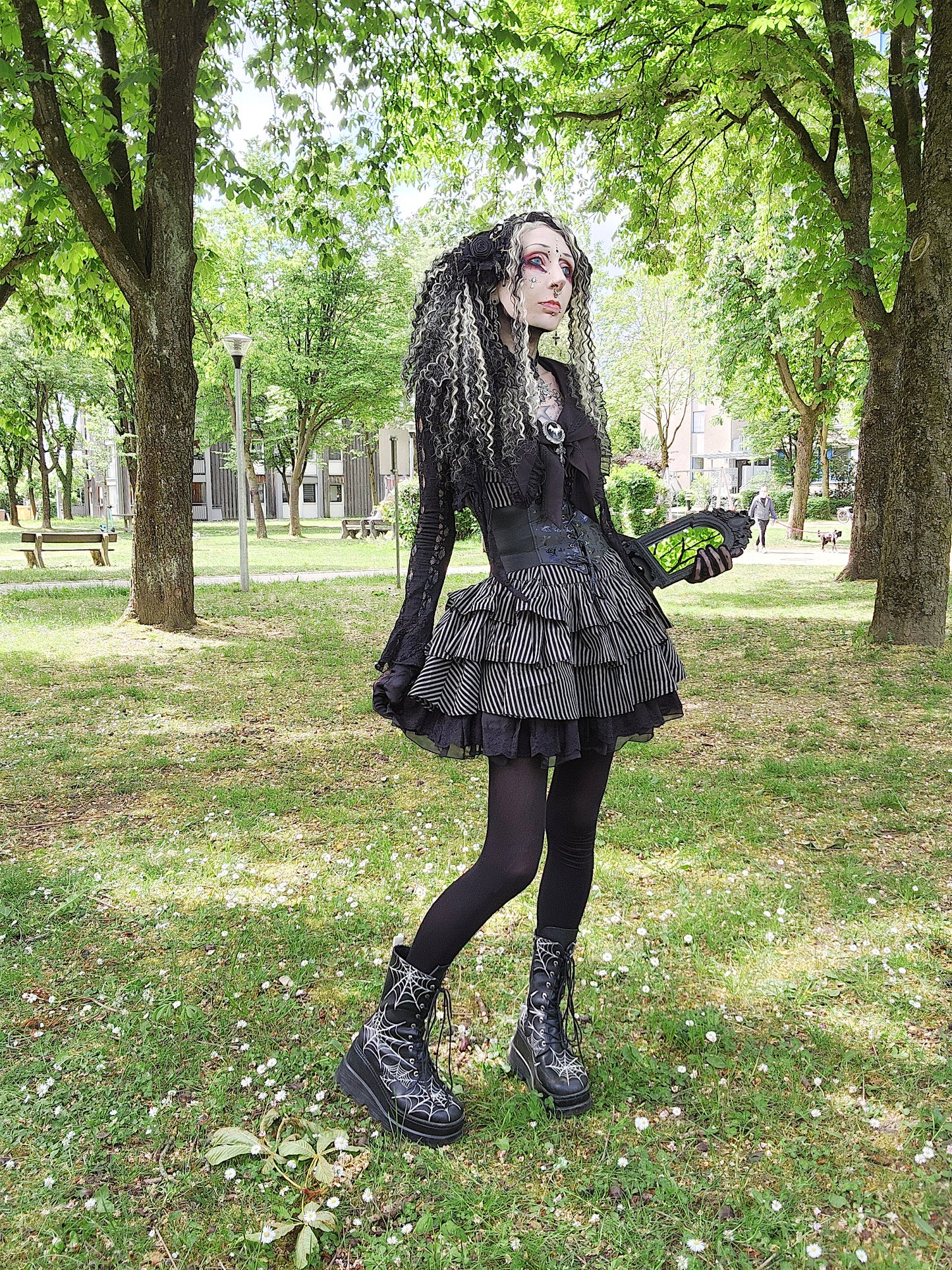 Valentinescorpse Dark in Love Vintage Striped Ruffle Tier Dress in a park setting