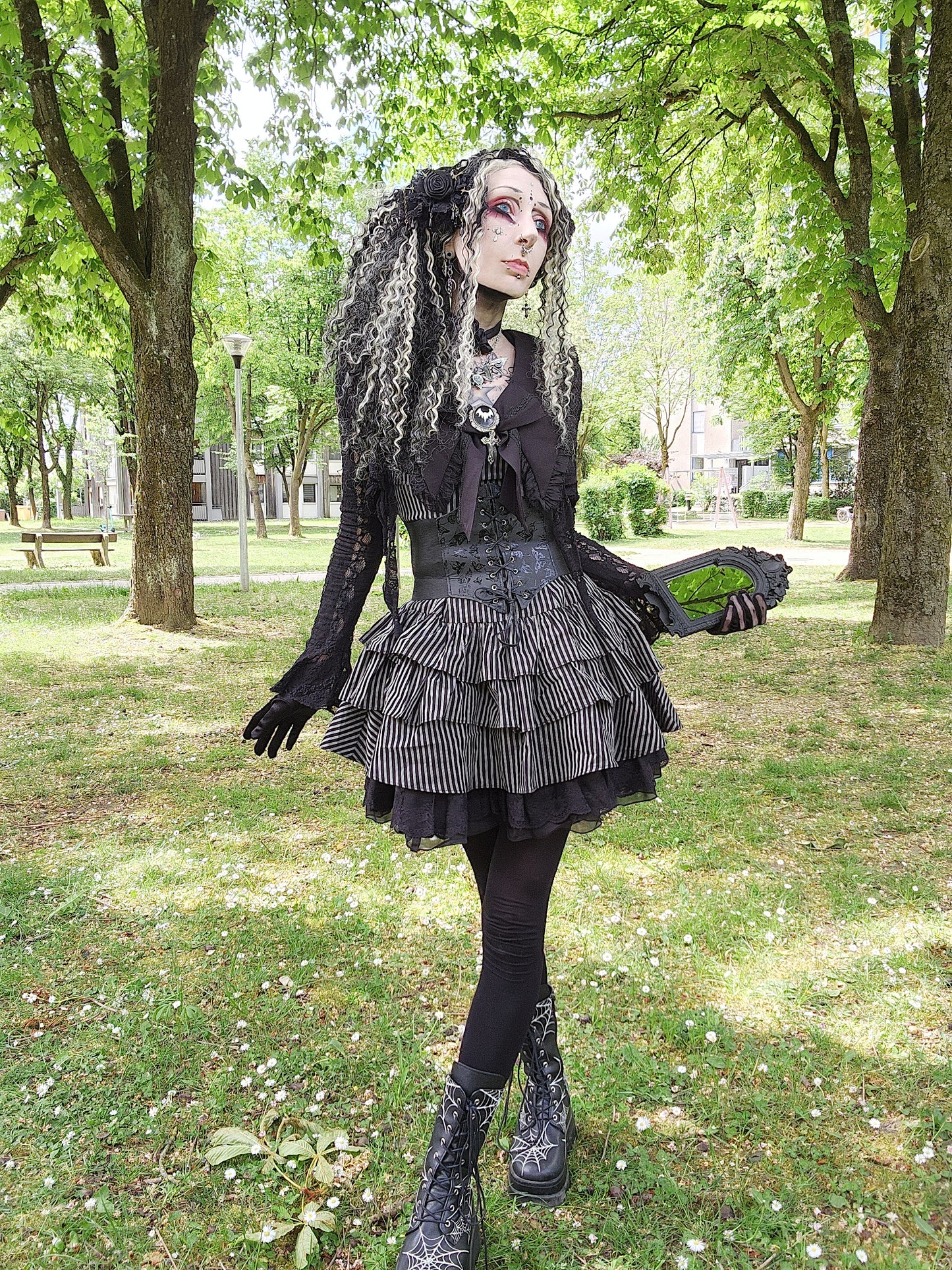 Valentinescorpse Dark in Love Vintage Striped Ruffle Tier Dress in a park