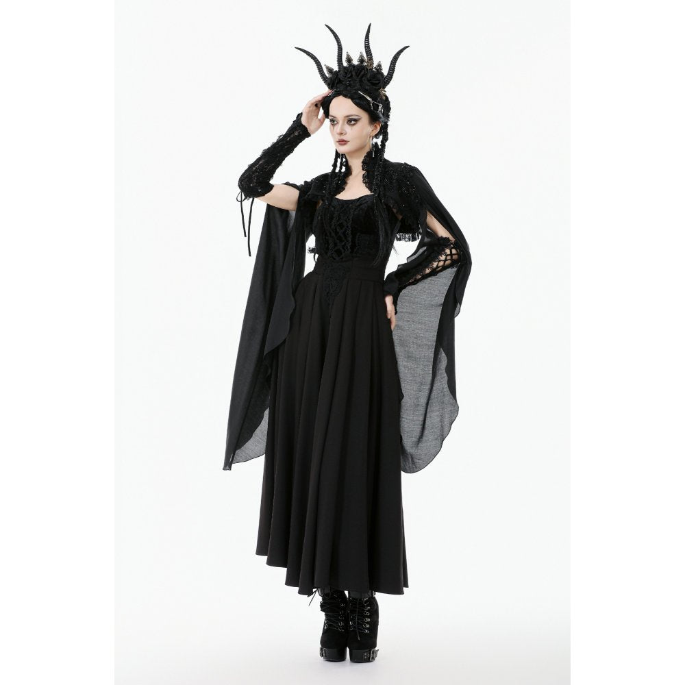 Shrug paired with dramatic headpiece and corset
