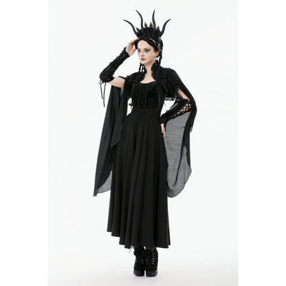 Shrug paired with dramatic headpiece and corset