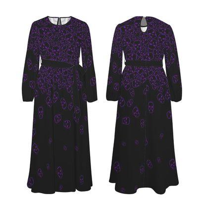 Alternative fashion maxi dress with tumbling skulls pattern