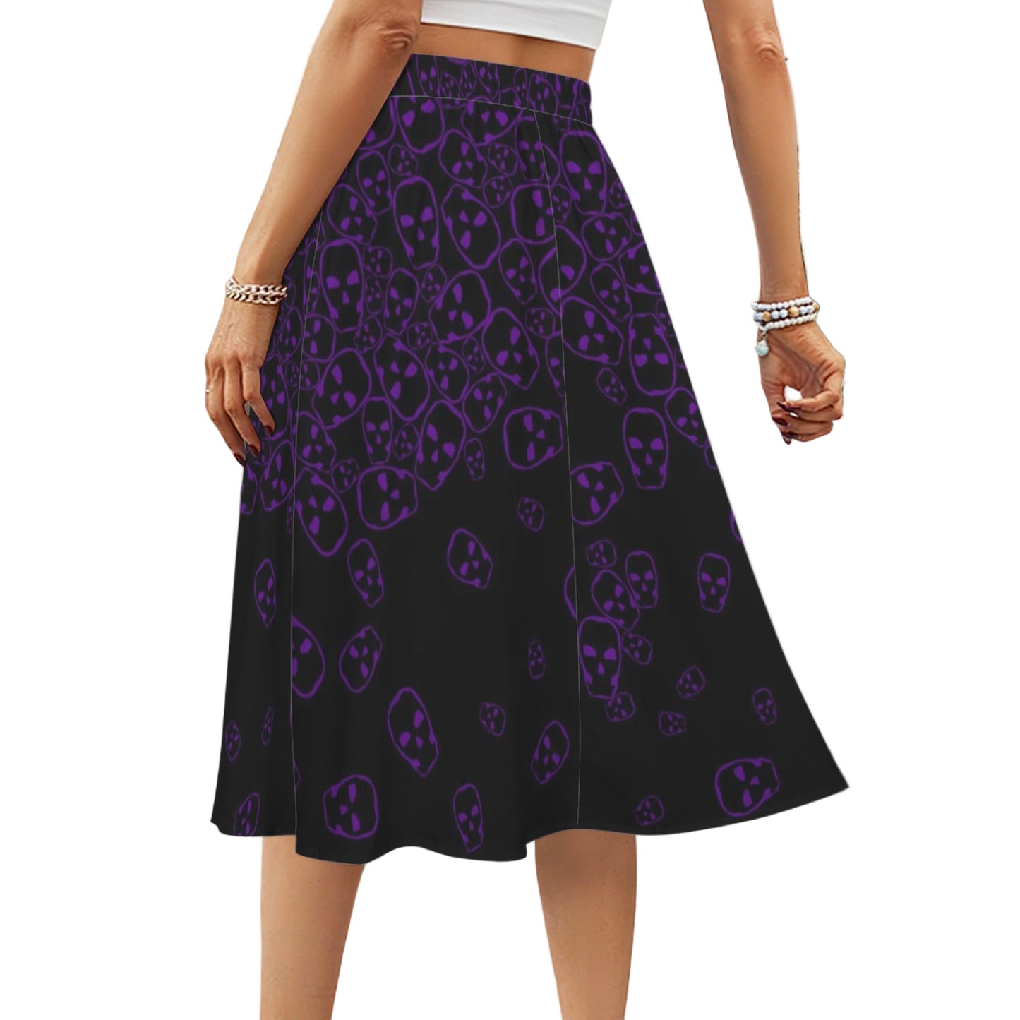 Back view of gothic black midi skirt with purple skull print