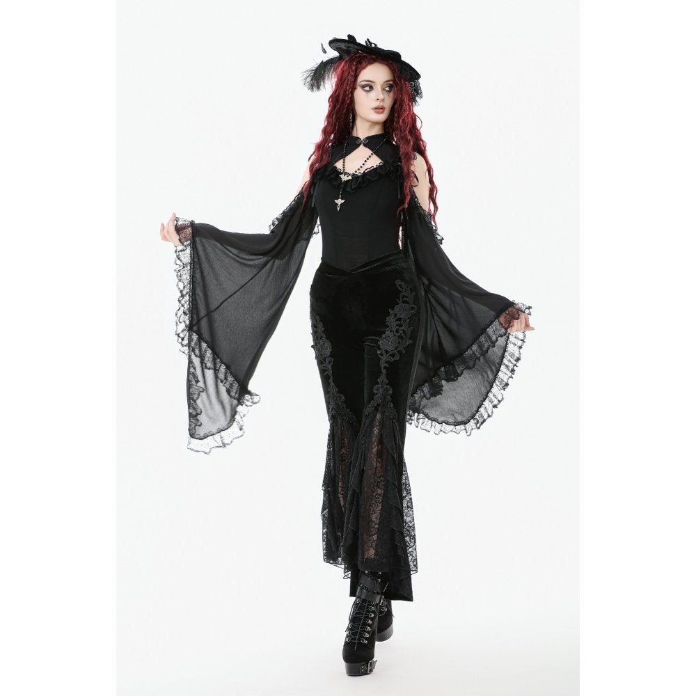 Tiered lace ruffle detail close-up on trousers