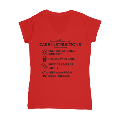 Red V-neck t-shirt with black “Care Instructions” funny print