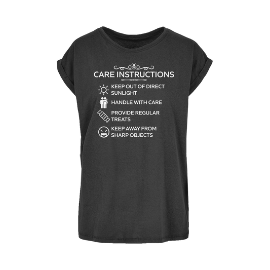 Women's extended shoulder tee with funny “Care Instructions” print