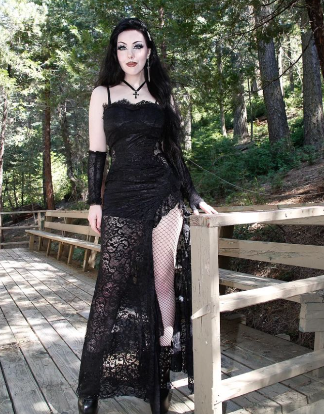 Dark in Love Naiara lace dress model standing wearing gothic lace maxi dress