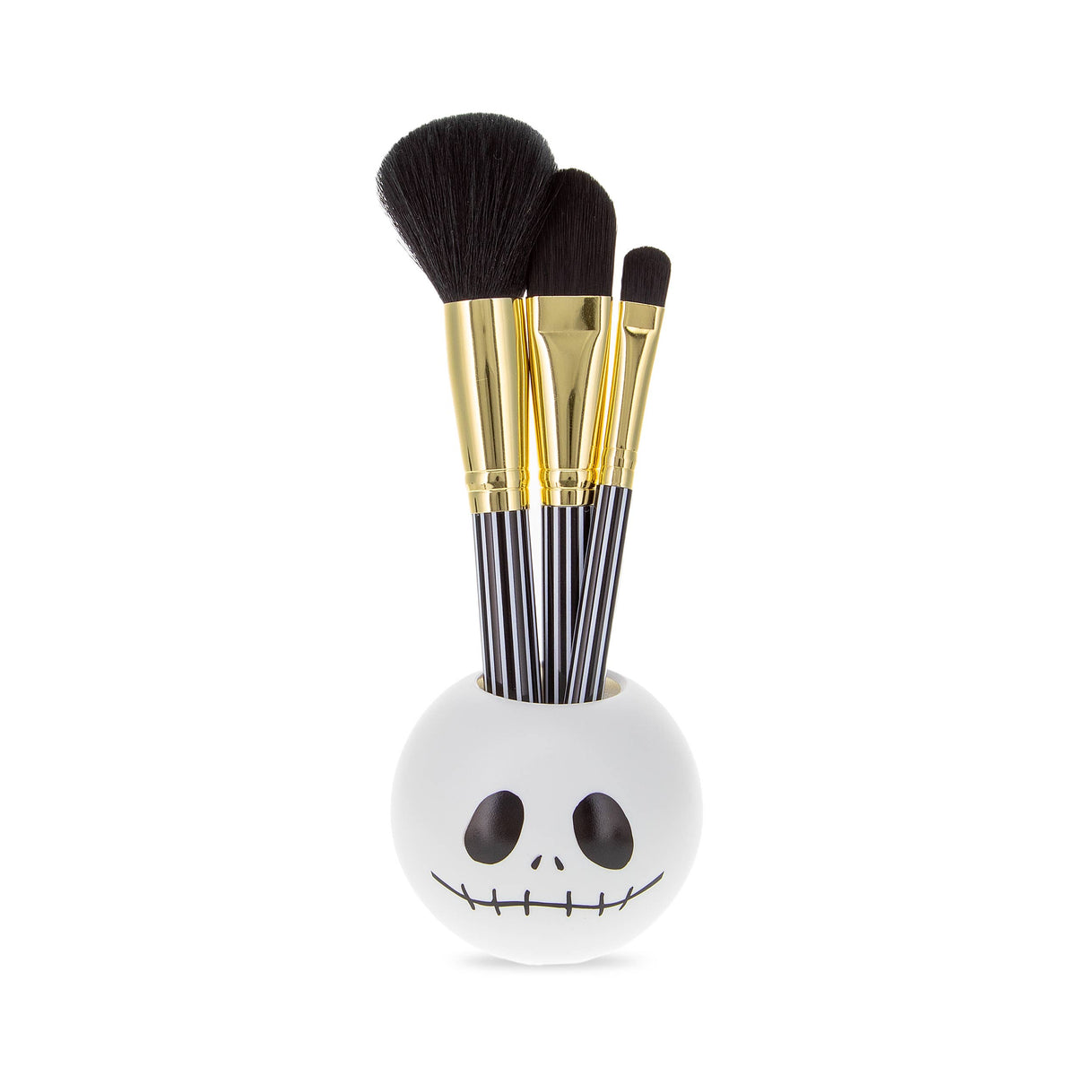Makeup brushes standing in the Jack Skellington head holder