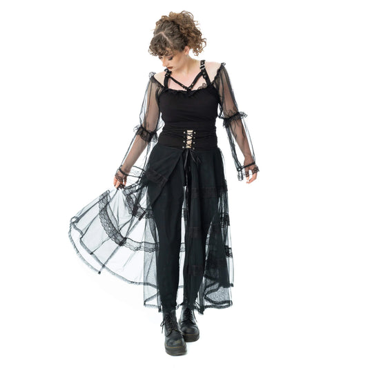 Model wearing the Poizen Industries Eliora Skirt Black, showcasing gothic style with flowing sheer panels and lace detailing.