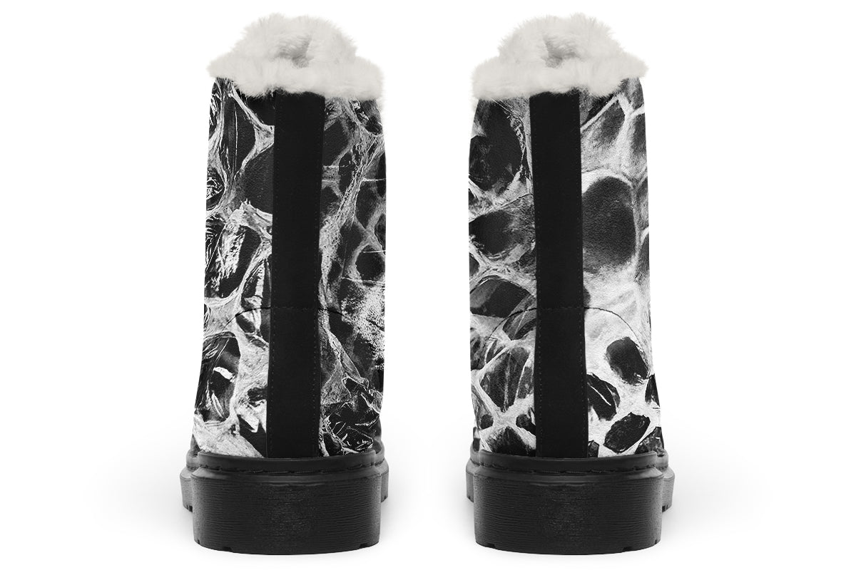 Fleece lined goth combat boots with snake skin design