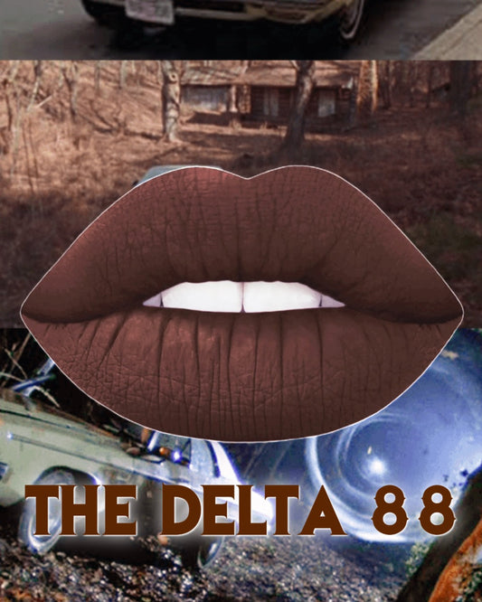 Radioactive Unicorn The Delta 88 deep brown lipstick image with bold lips and cinematic background.