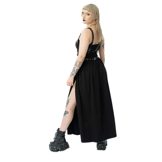 Model showcasing Vixxsin Junia Maxi Dress Black, featuring a flowing silhouette and bold gothic style.