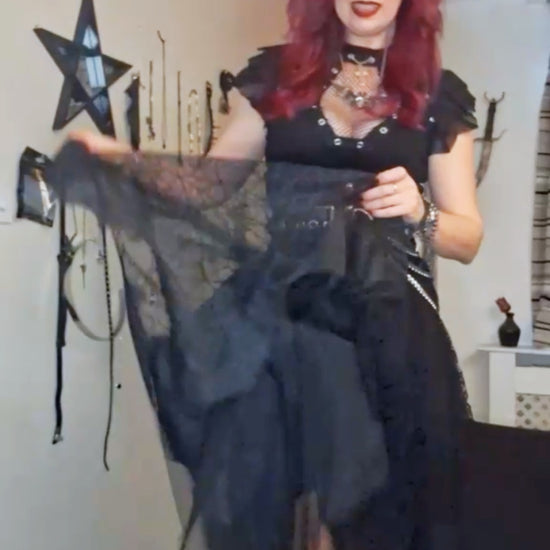 Kate wearing the Punk Rave Vespera bat wing mesh skirt with the Dark in Love Punk Coffin mesh panel top, in motion