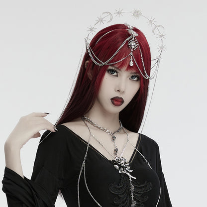 Punk Rave Estrella celestial crown with sun moon and star charms worn by model