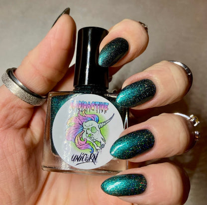 Radioactive Unicorn The Kraken nail polish deep emerald glitter manicure with sparkling ocean inspired finish