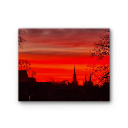 The Ember Hour premium stretched canvas with red sunset skyline