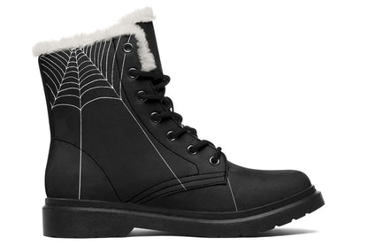 Black boot with spider web design and white fur lining on a white background