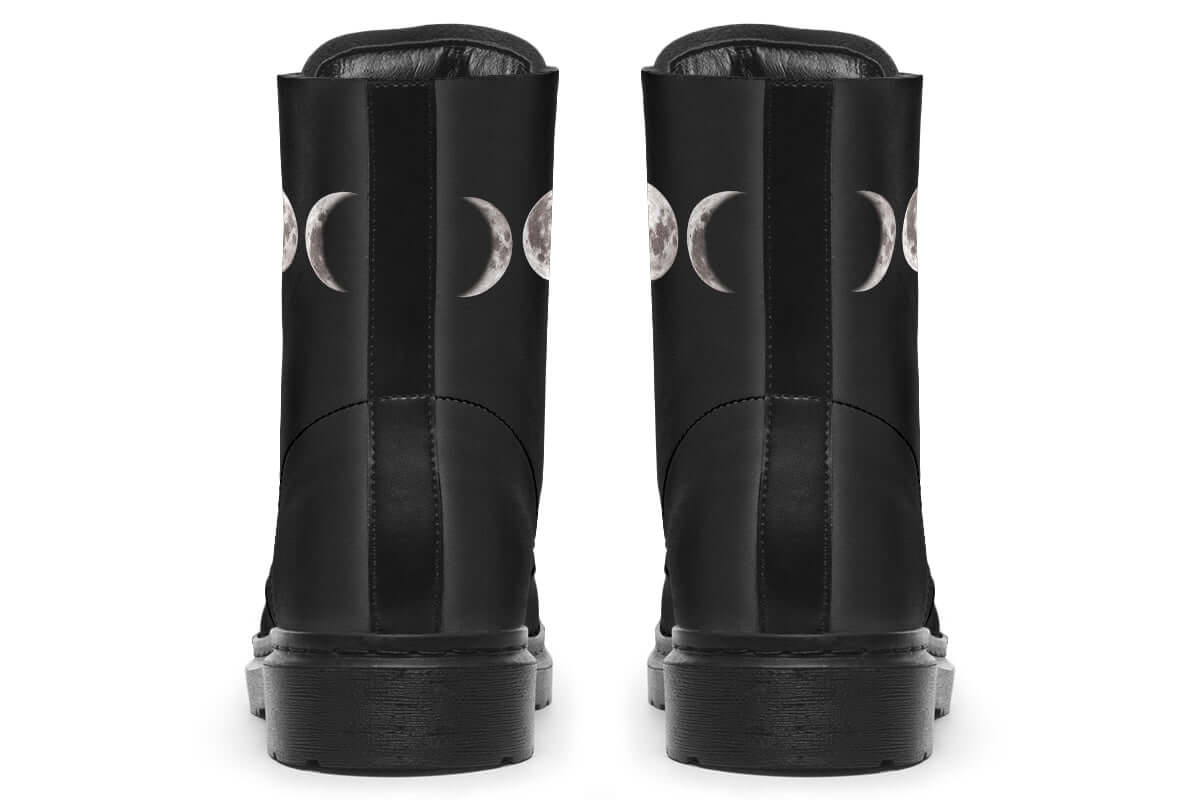 Witchy black boots with triple moon goddess design and combat style