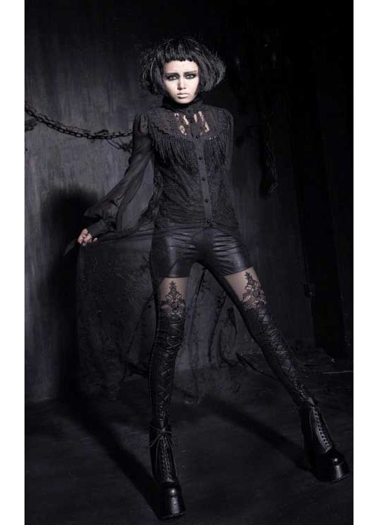 Black gothic leggings showing embroidered mesh stocking effect and brocade pattern detail