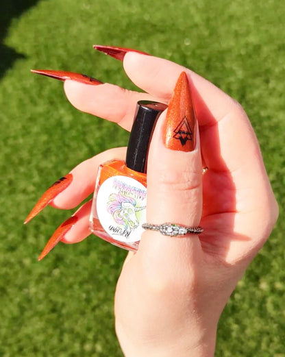 Hallow-Queen striking pumpkin orange nail polish by Radioactive Unicorn