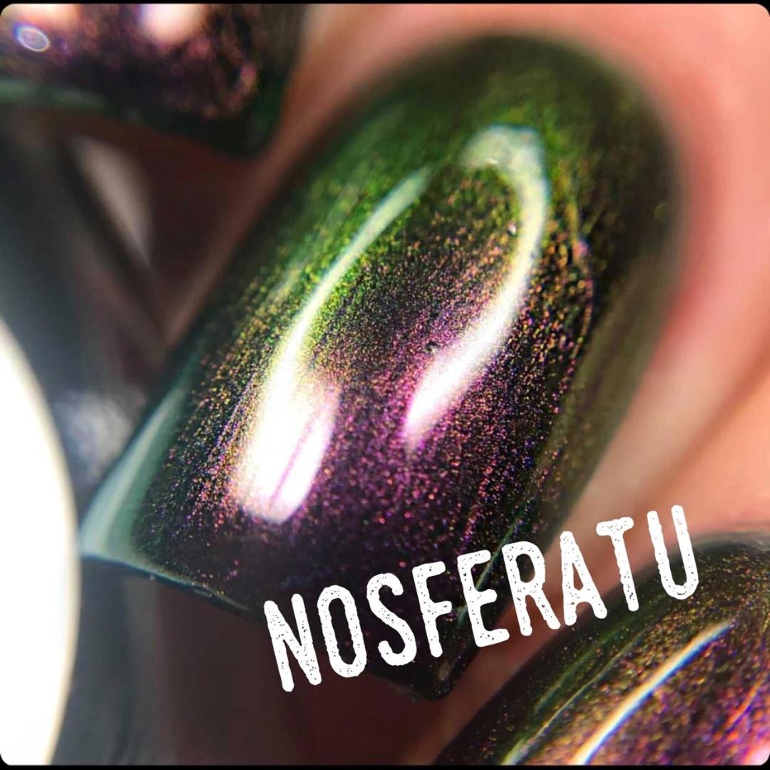 Radioactive Unicorn Nosferatu glitter green purple light reflecting nail polish vegan