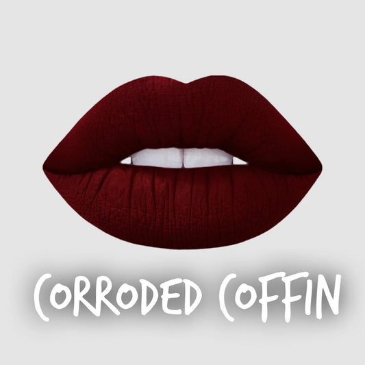 Radioactive Unicorn Corroded Coffin lipstick swatch matte dark red purple shade with dramatic gothic colour